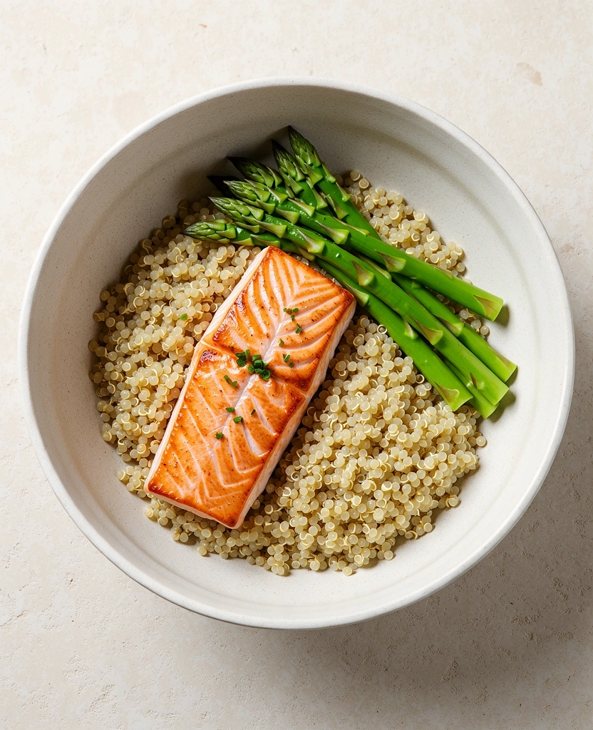 Balanced daily menu example with salmon and greens